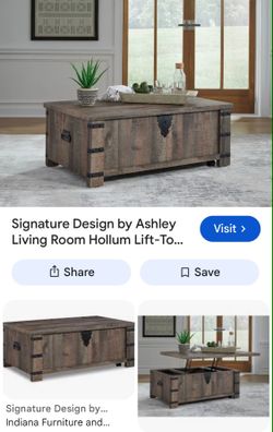 BRAND NEW COFFEE TABLE WITH LIFT TOP  BY ASHLEY DESIGN