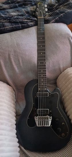 Black Electric Guitar with Dual Pickups