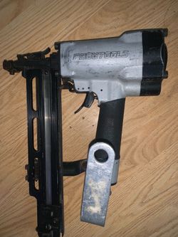 Pneutools branded pneumatic nailer/stapler.