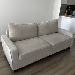 Living Spaces Grey Loveseat Sofa