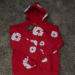 Red denim tear 