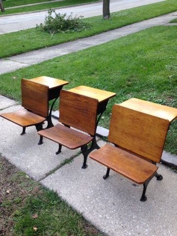 Three vintage school desks