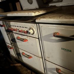 Old antique propane stove. $200.00