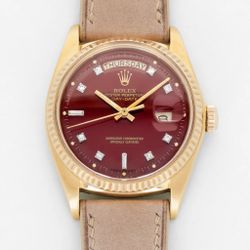 ROLEX YELLOW GOLD DAY-DATE REF. 1803 WITH OXBLOOD STELLA AND DIAMOND DIAL