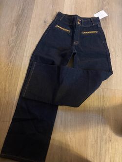 Celine Dark Wash High-Rise Jeans with Gold Chain Detail