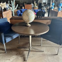 mid-century modern table and two chairs