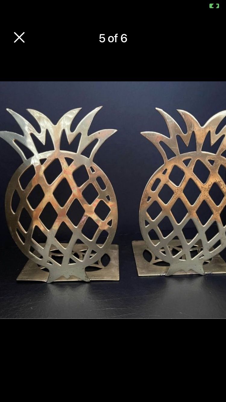 Pair of antique brass pineapple bookends or statues in good vintage condition. Set of 2 just…