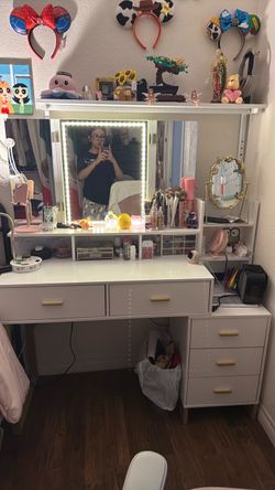 Vanity with mirror and drawers