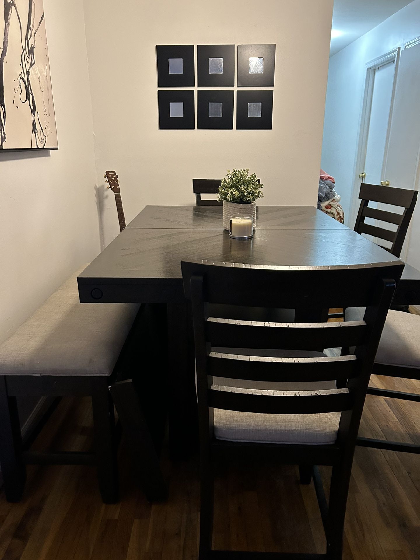 wooden dining room with expandable table and center cabinet💯