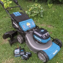 Makita 40 Volt Lawn Mower With (2) 4.0Ah Batteries And Charger. Used Model GML01