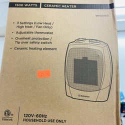 BRAND NEW PORTABLE CERAMIC HEATER  