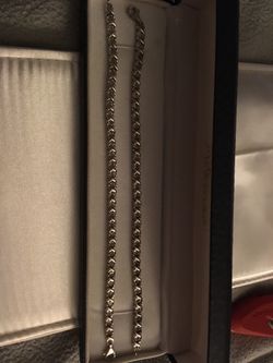 Two silver diamond bracelets