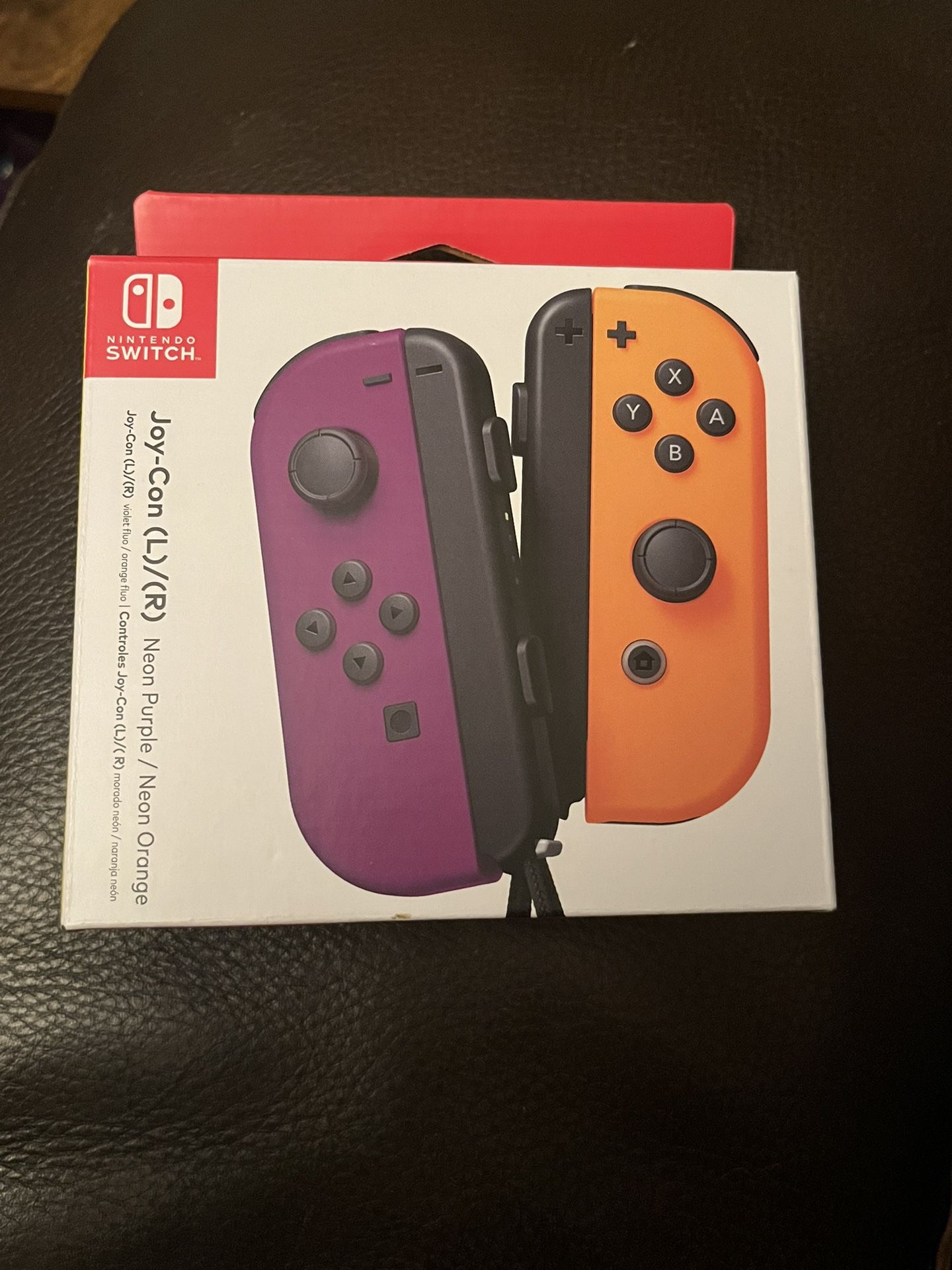 Nintendo Switch Joy Con neon purple/neon oran