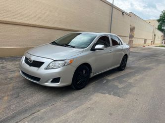 2009 Toyota Corolla  LE con 131 mil millas