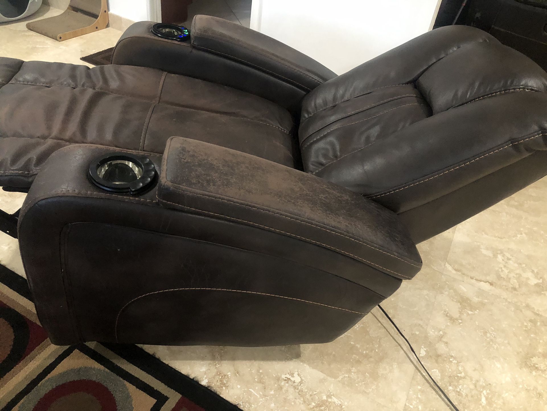 Recliner with cup holder, lights, different adjustable position .