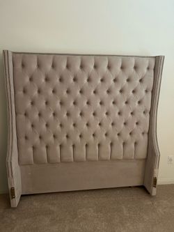 Queen bed with frame, mattress, box spring, and ottoman