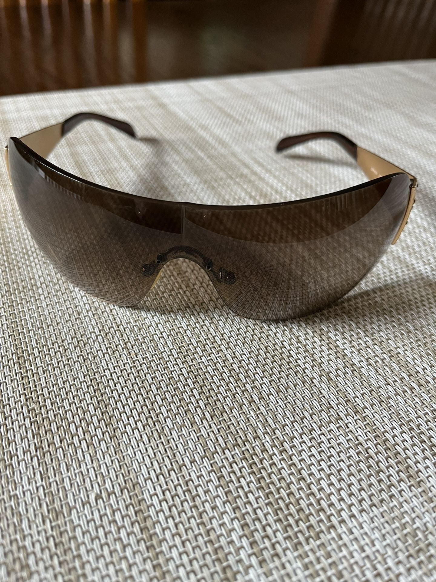 There Very Beautiful Sunglasses For Women’s Made By PRADA Made In Italy The Color Is Brown& Gold