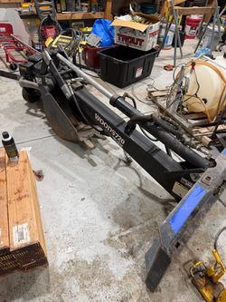 Back hoe attachment skid steer