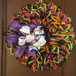 Halloween Mesh Tubing Wreath With Black Spiders.