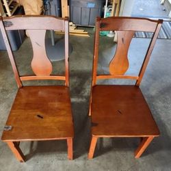 Two (2) Distress wooden dining chairs