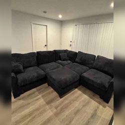 Black Sectional sofa with ottoman