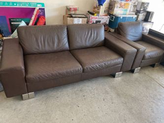 Couch and loveseat. Leather. NATUZZI
