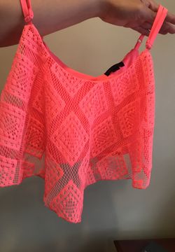 Pinkish/orangy colored top