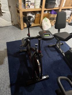 Stationary gym bicycles and stretcher