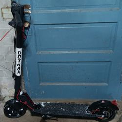 Adult Scooter. Needs Battery And Hand Brake Fix
