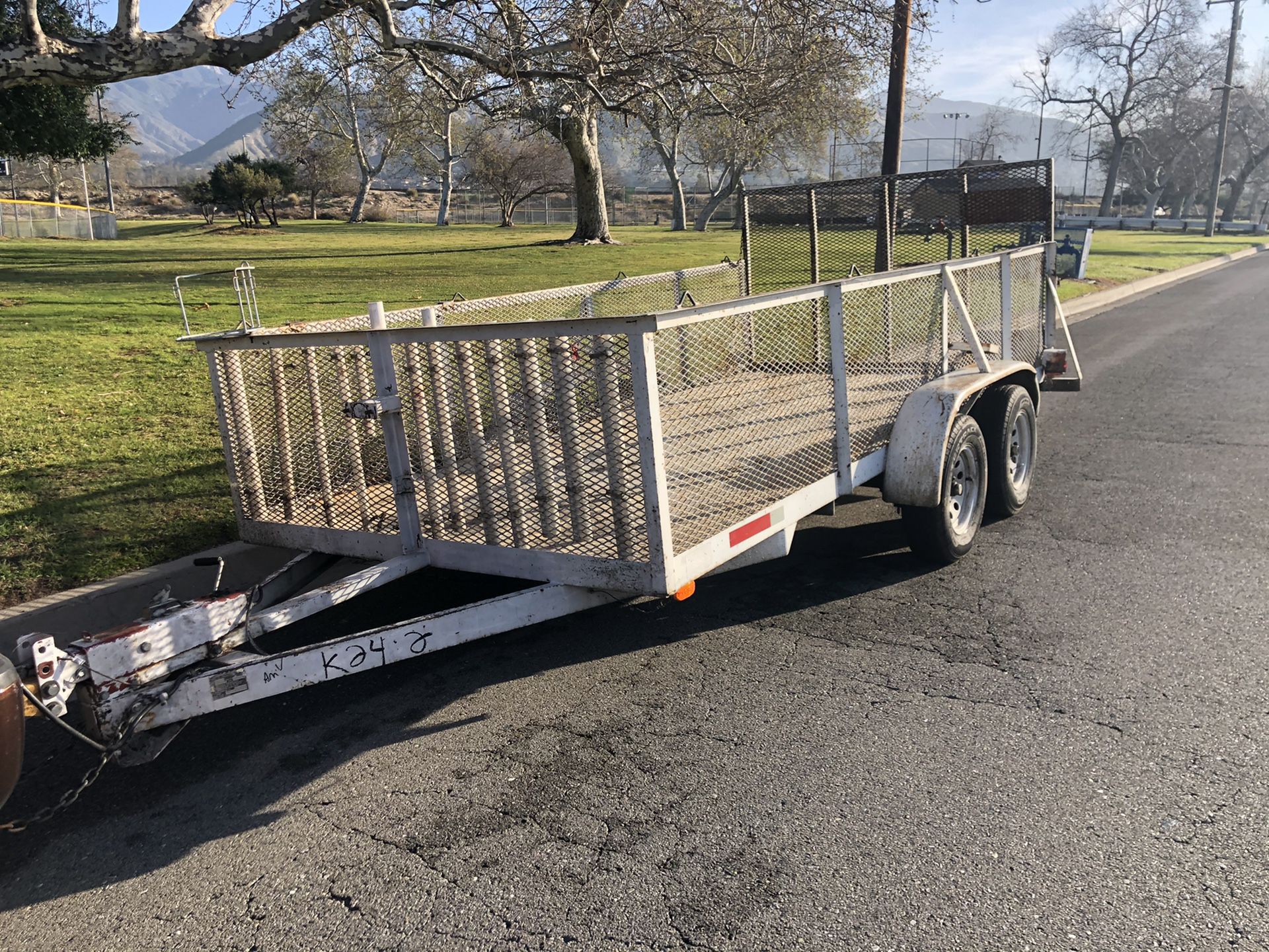 Trailer for sale 7x14 migselling my trailer Pinkslip in hand permanent tags new tires electric brakes ramp heavy duty ready to work