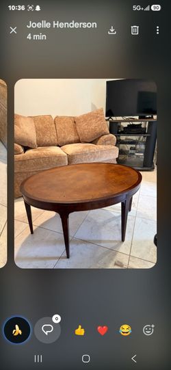 Vintage oval coffee table with leather top