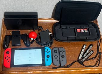 143GB Nintendo Switch Bundle - Console, 2 Sets of Joy-Cons, Poké Ball Plus, 3 Games, 128GB SD Card