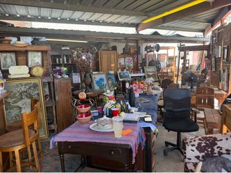 Preowned furniture warehouse is located at 11411 S. FORTUNA Road AZ 85367