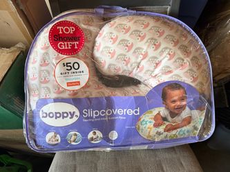 Baby boppy feeding pillow