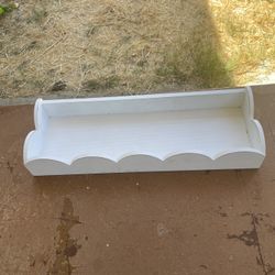 small white hanging shelf