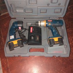 Ryobi - Drill, Charger, Light And 2 Batteries 