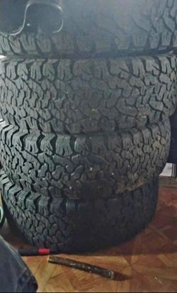 265/75/R16 Full set 16" bfg Goodrich all terrain t/a  LT TIRES 70% TREAD REMAINING ON POLISHED STAINLESS 8 LUG