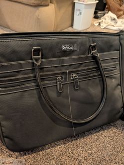 Quickutz bag, tool, and embossing plates