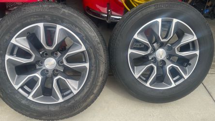Stock OEM Chevy rims 20”