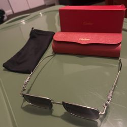 Men Cartier shades with jaguar 