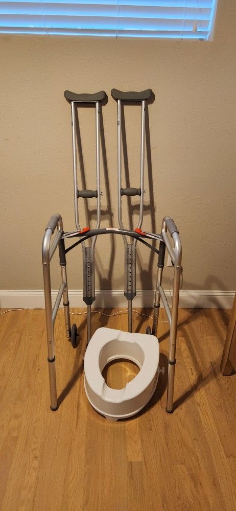 Crutches, Walker, and raised Toilet Seat