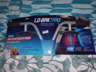 LO-BAK TRAX  EXCERCISER THAT DECOMPRESSES YOUR SPINE W/DVD NEW CONDITION $5.00 CASH.