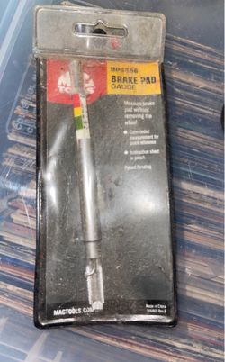 MAC Tools BP6596 brake pad gauge with a color-coded measurement scale for quick reference.