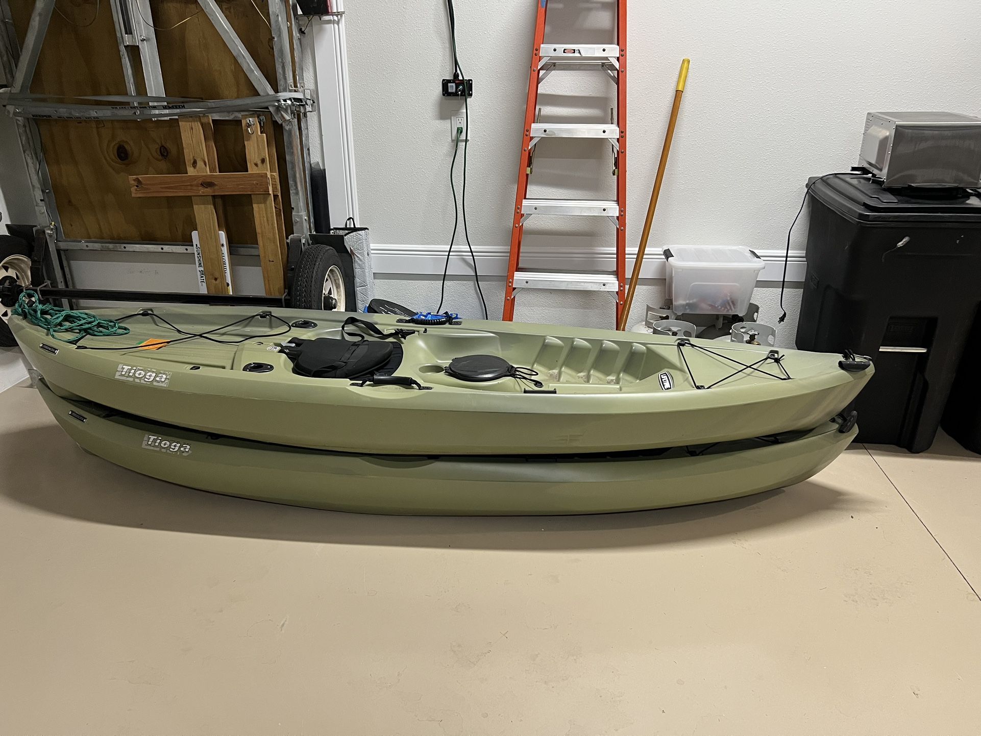 Two Fishing Kayaks Plus Paddles Like New