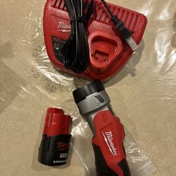 Milwaukee Light And Battery And Charger 