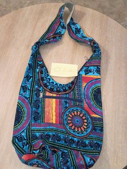 Boho Fabric Hobo Shoulder Bag holding the Elegance of a conscious woman