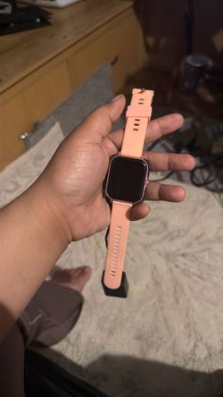 Pink smart watch generic not an Apple Watch