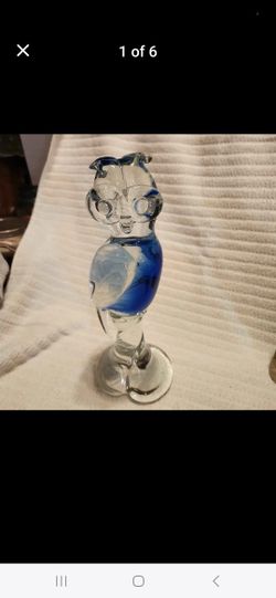 Heavy Murano glass parrot...clear with blue coloring...11.5 inches tall...buy it for $50.00
I AM CLEARING OUT 2-10 x15 STORAGE UNITS!