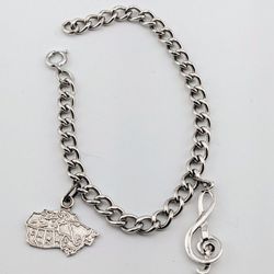 Sterling Silver Canada And Musical Charms Bracelet 