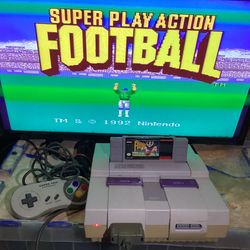 SUPER NINTENDO SNES CONSOLE  with 1 Controller Av cord Power cord and 1 Game   System works plays games and both controller ports work  Comes with  Co